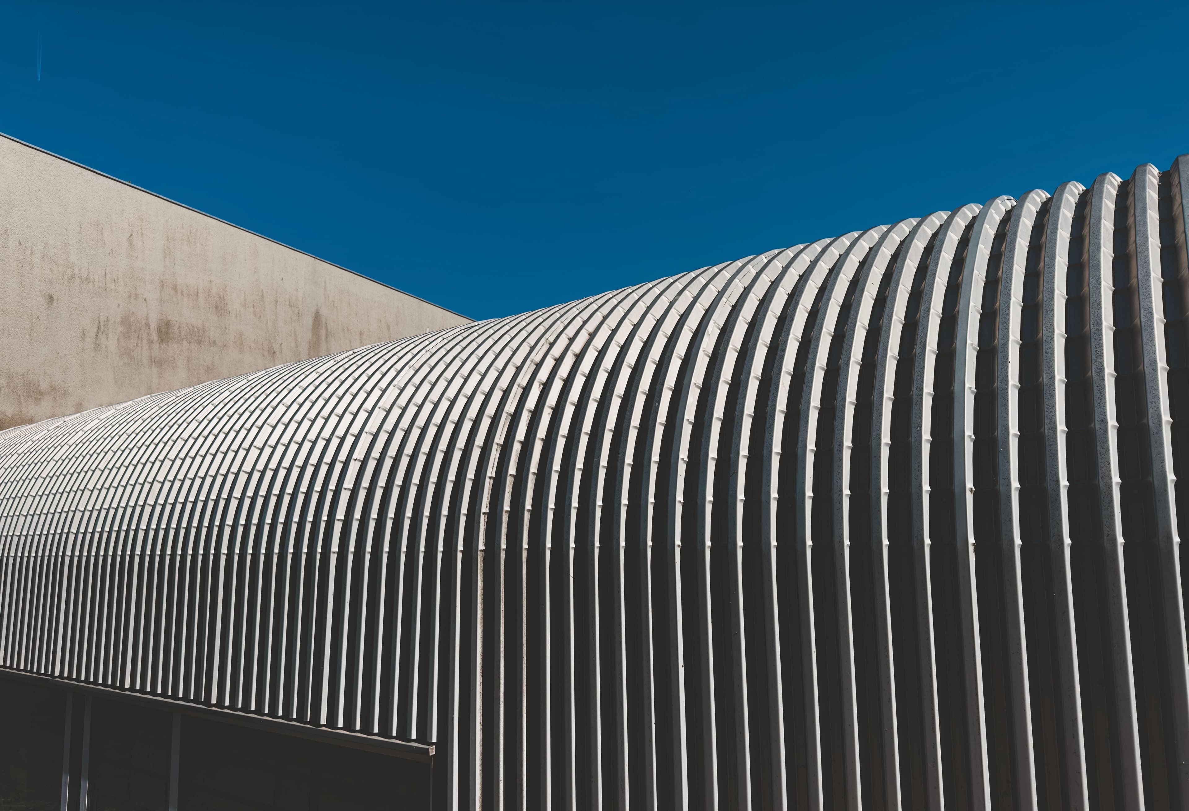 Corrugated metal roofing facade